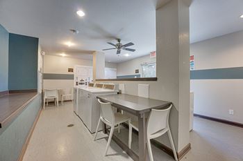 White chairs and grey table